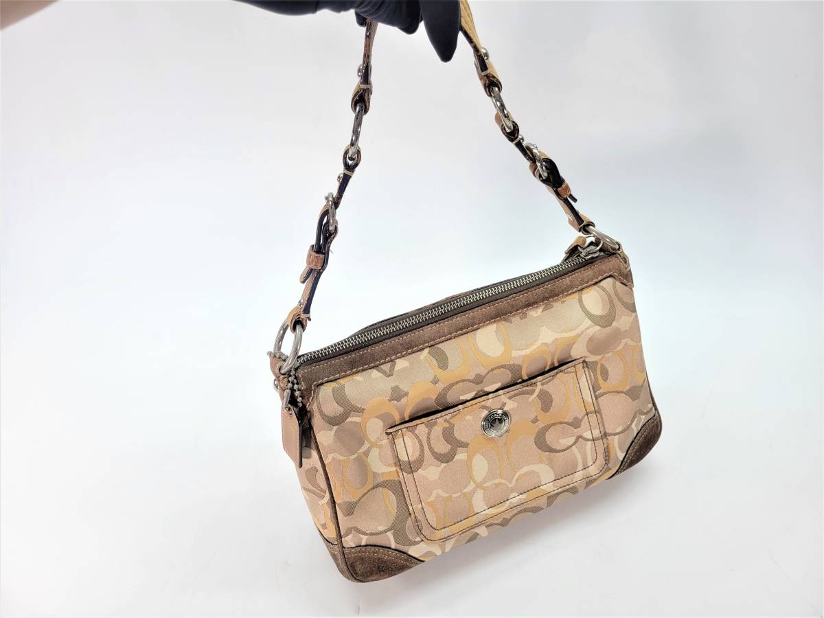 【中古】COACH(コーチ)ハンドバッグ アクセサリーポーチ シグネチャー　総柄 ベージュ レザー スエード サテン キャンバス レディー