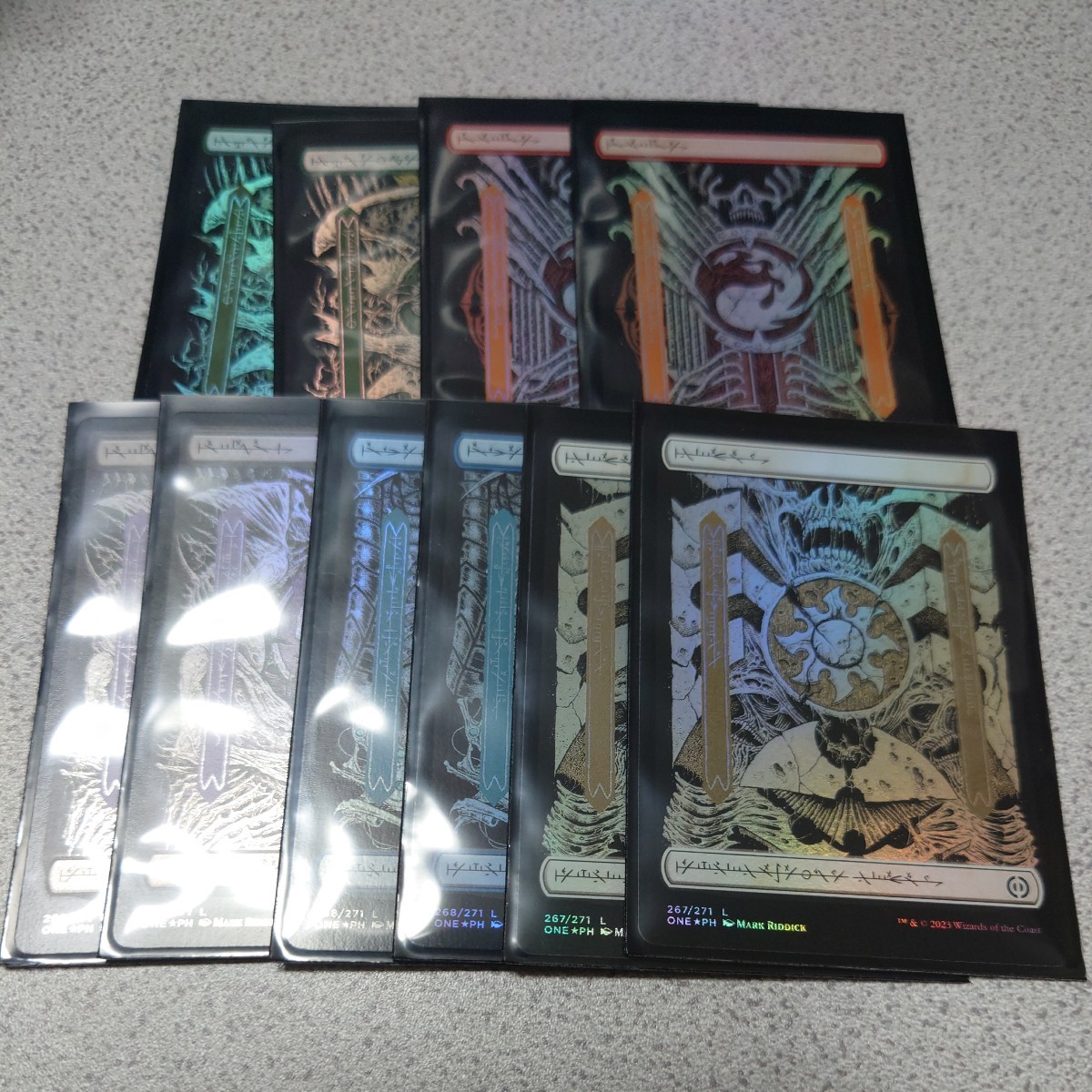 MTG ONE 基本土地 まとめ ファイレクシア語foil 各2枚 10枚セット ボーダーレス ファイレクシア：完全なる統一 島 山 森 沼 平地 即決の画像1