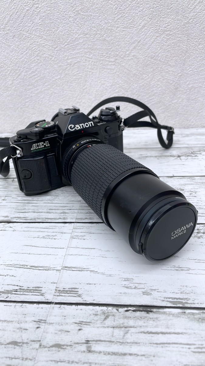 Canon キャノン 一眼レフカメラ AE-1 フィルムカメラ ボディ ブラック レンズ付き OSAWA MARKⅡ プログラム 1110795【1159】