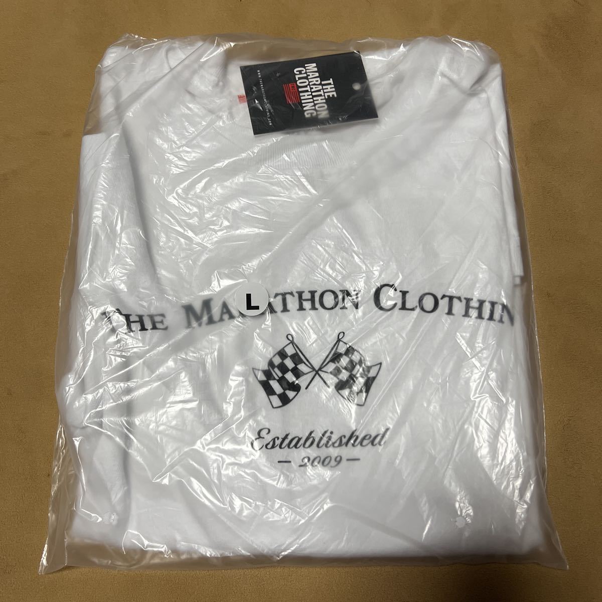 新品未使用　the marathon clothing マラソンクロージング　TMC Tシャツ　サイズL ニプシーハッスル　ホワイト