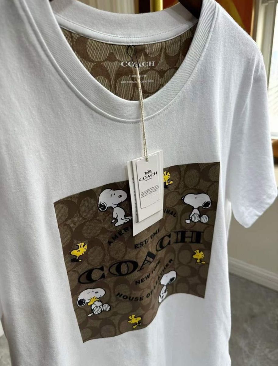 ★年末セール★ 新品COACH スヌーピー限定品 Tシャツ シグネチャー 半袖Tシャツ WHITE コラボTシャツ 