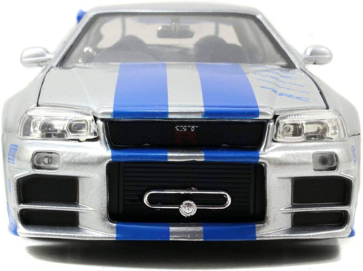 Jada Toys ワイルド・スピード ブライアンの 2002 日産 スカイライン R34 ダイキャストカー、1:24 スケール、シルバー & ブルーn213