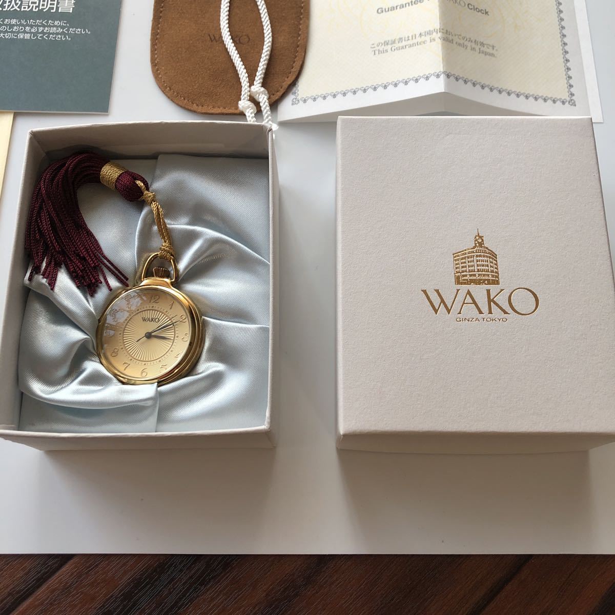 銀座 和光 WAKOクロック OB001G ルーペ付き提げ時計 付属品有り レディース ゴールド×ワインレッド クォーツ 新品 未使用品_画像4