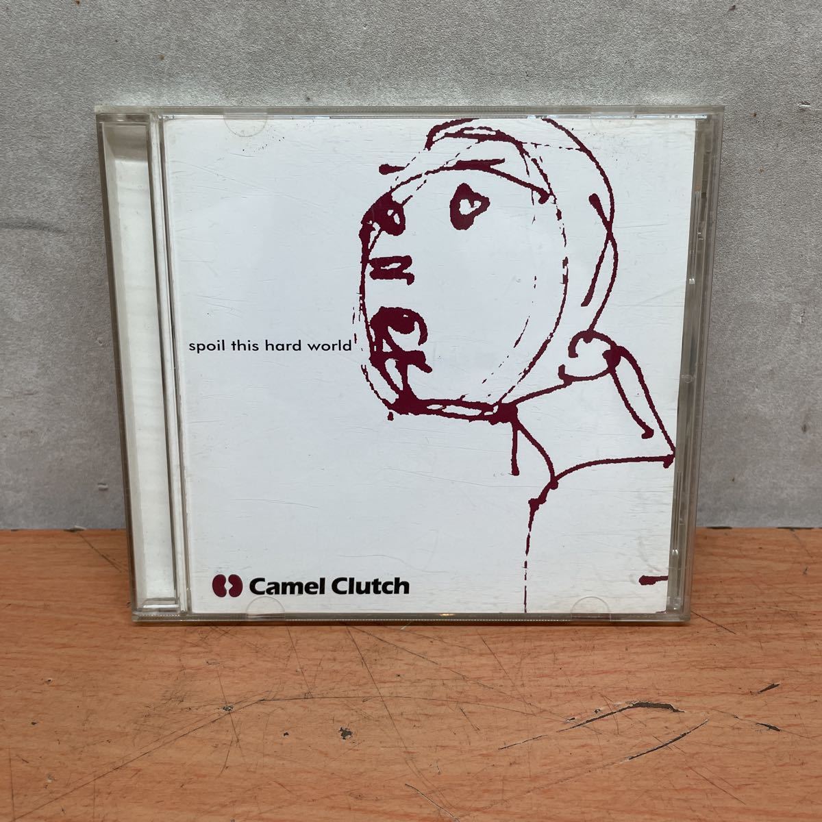中古CDアルバム　spoil this hard world / Camel Clutch_画像1