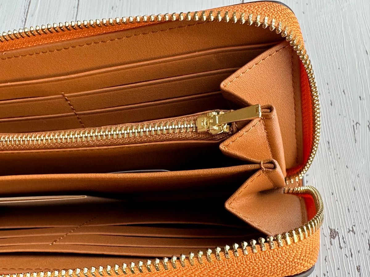 新品・未使用】COACHコーチ長財布オレンジシグネチャーストラップ付き