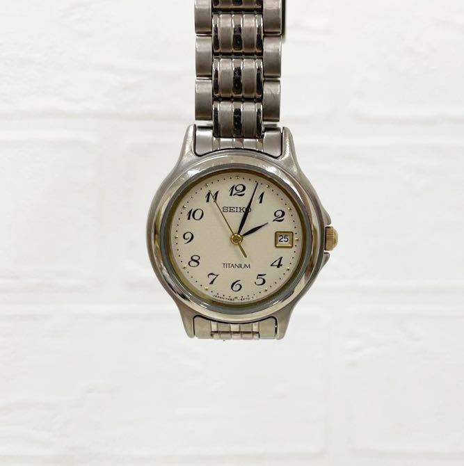1049E☆ SEIKO TITANIUM セイコー クォーツ 腕時計 ウォッチ 3針 日付