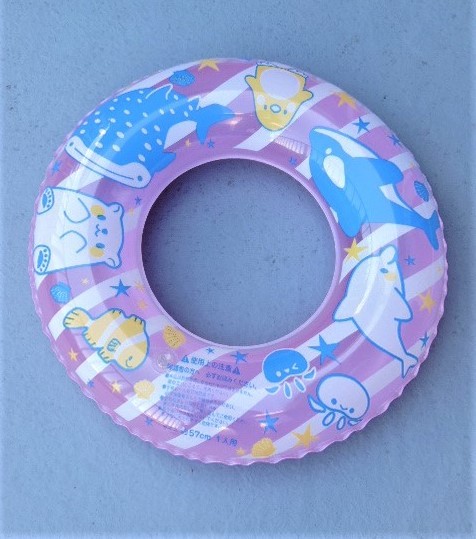 * penguin * whale * dolphin pattern for children swim ring approximately 57cm playing in water * sea water .* pool *