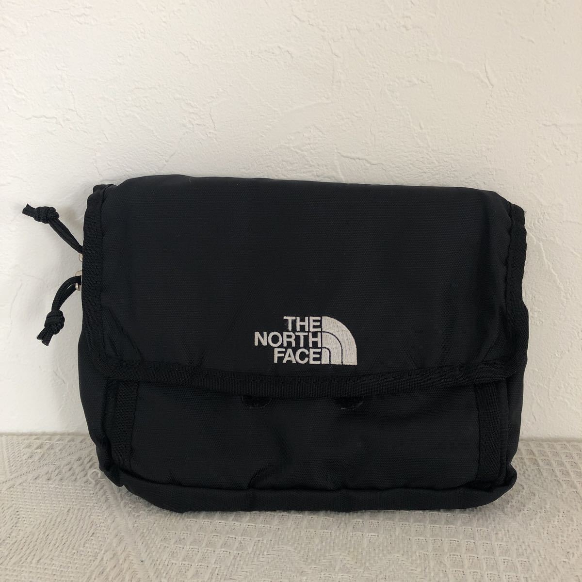 (k) THE NORTH FACE ノースフェイス フロント アクセサリポケット ポーチ 黒 ブラック アウトドア キャンプ 登山 _画像1