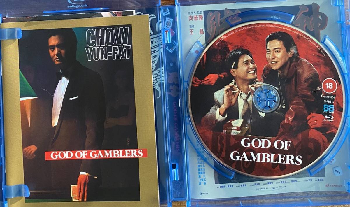 チョウ・ユンファ、アンディ・ラウ、ジョイ・ウォン/『ゴッド・ギャンブラー』(原題：賭神、God of Gamblers）/イギリス発売/ブルーレイ_写真集とディスク