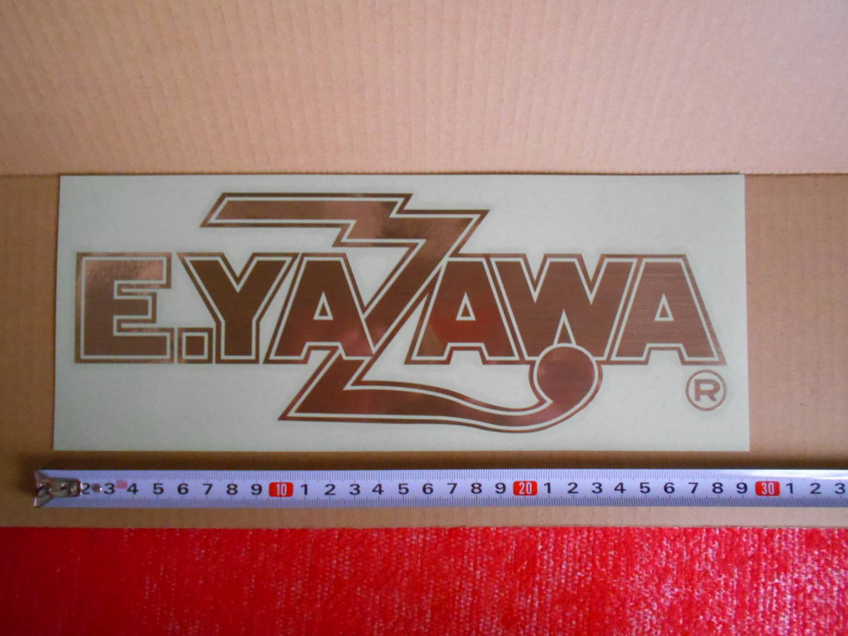 矢沢永吉　E.YAZAWA　ロゴ　ステッカー　29ｃｍ　抜き文字　カッティングステッカー　ゴールド　金　未使用　正規品　定形外220円。_画像1