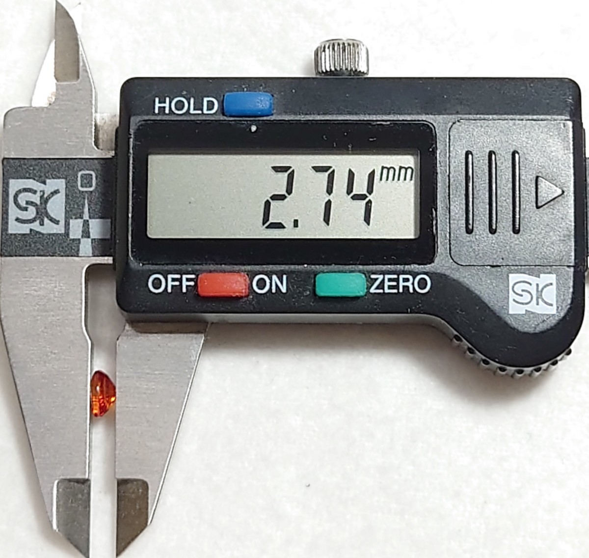 オレンジサファイア　0.53ct ルース　微細なカケ（LA-6320）