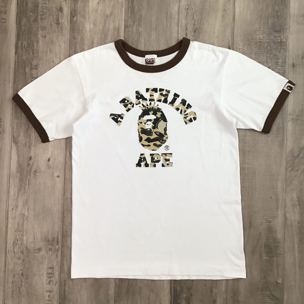 KAWS × BAPE camo NYC カレッジロゴ Tシャツ Sサイズ a bathing ape カウズ エイプ ベイプ アベイシングエイプ bendy 迷彩 m22