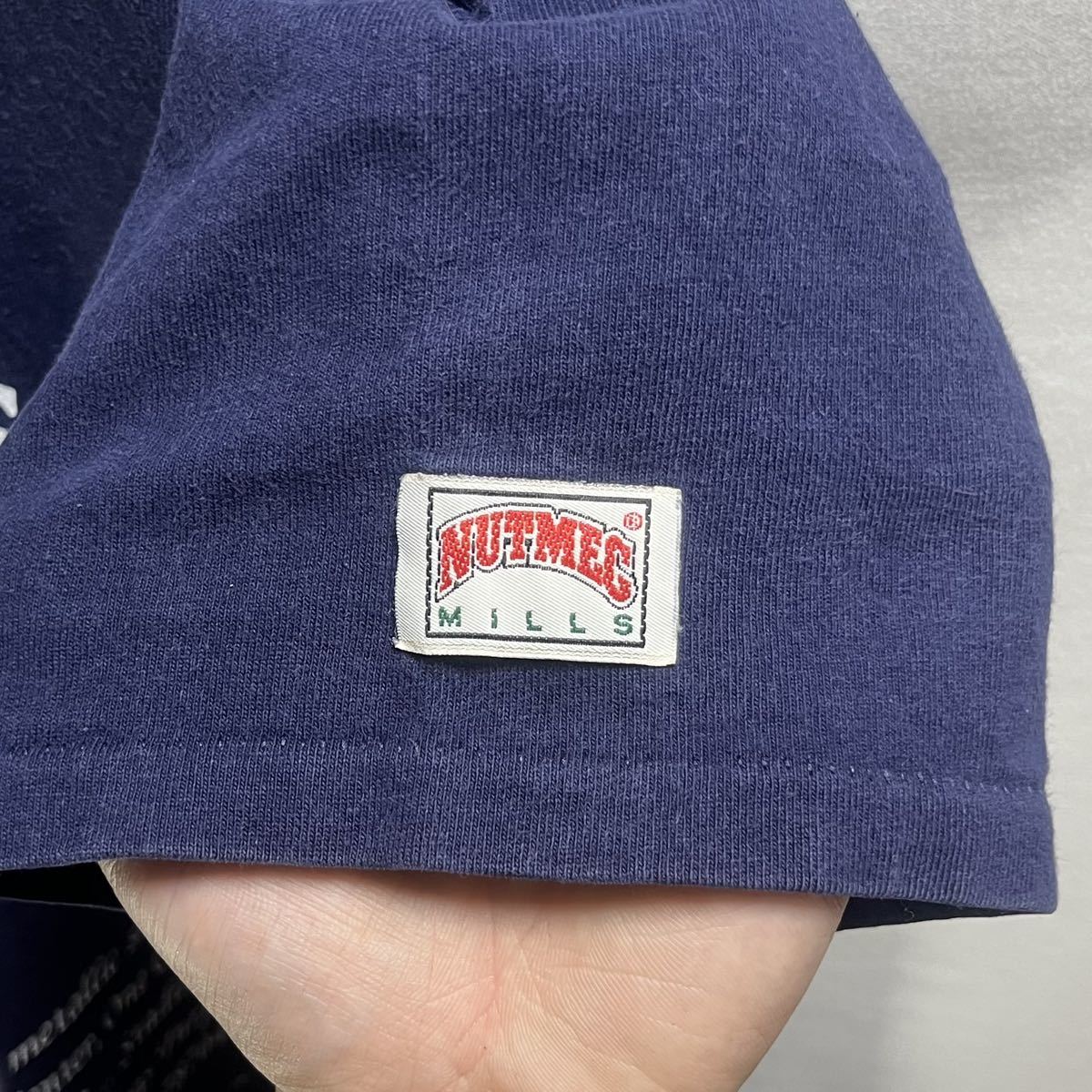 ■ 90s 90年代 ビンテージ USA製 NUTMEG NFL COWBOYS カウボーイズ 刺繍ロゴ入り イラスト Tシャツ サイズXL 紺 アメフト スポーツ 観戦 ■_画像5