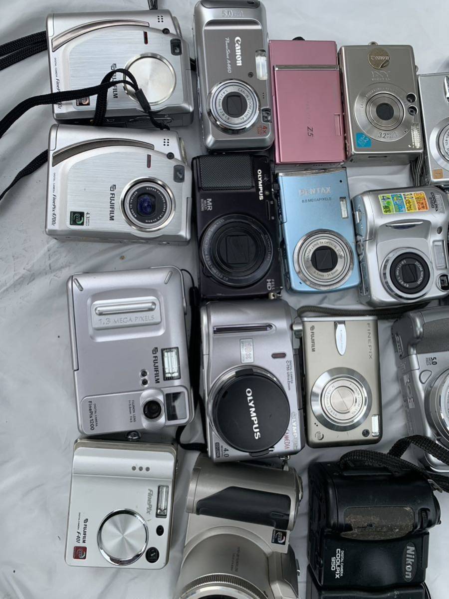 Canon IXY PowerShot Nikon COOLPIX OLYMPUS PEN PENTAX LUMIX