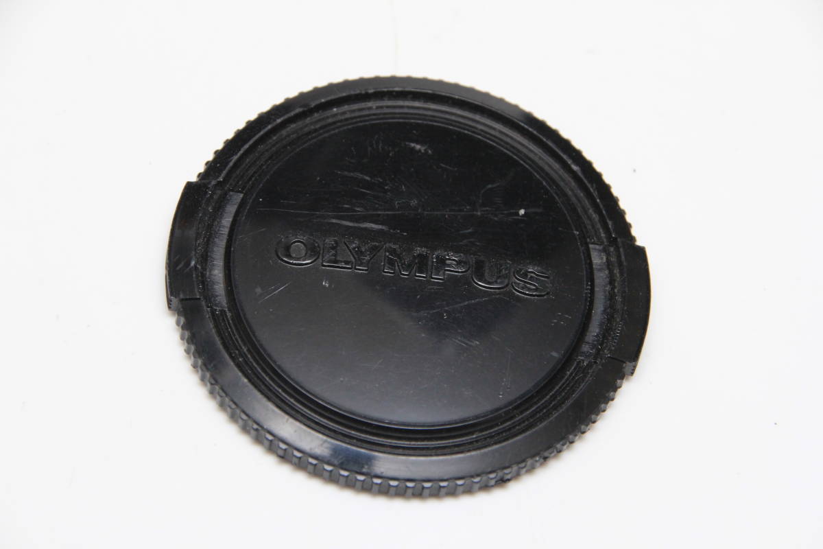  Olympus OLYMPUS 49mm lens cap.
