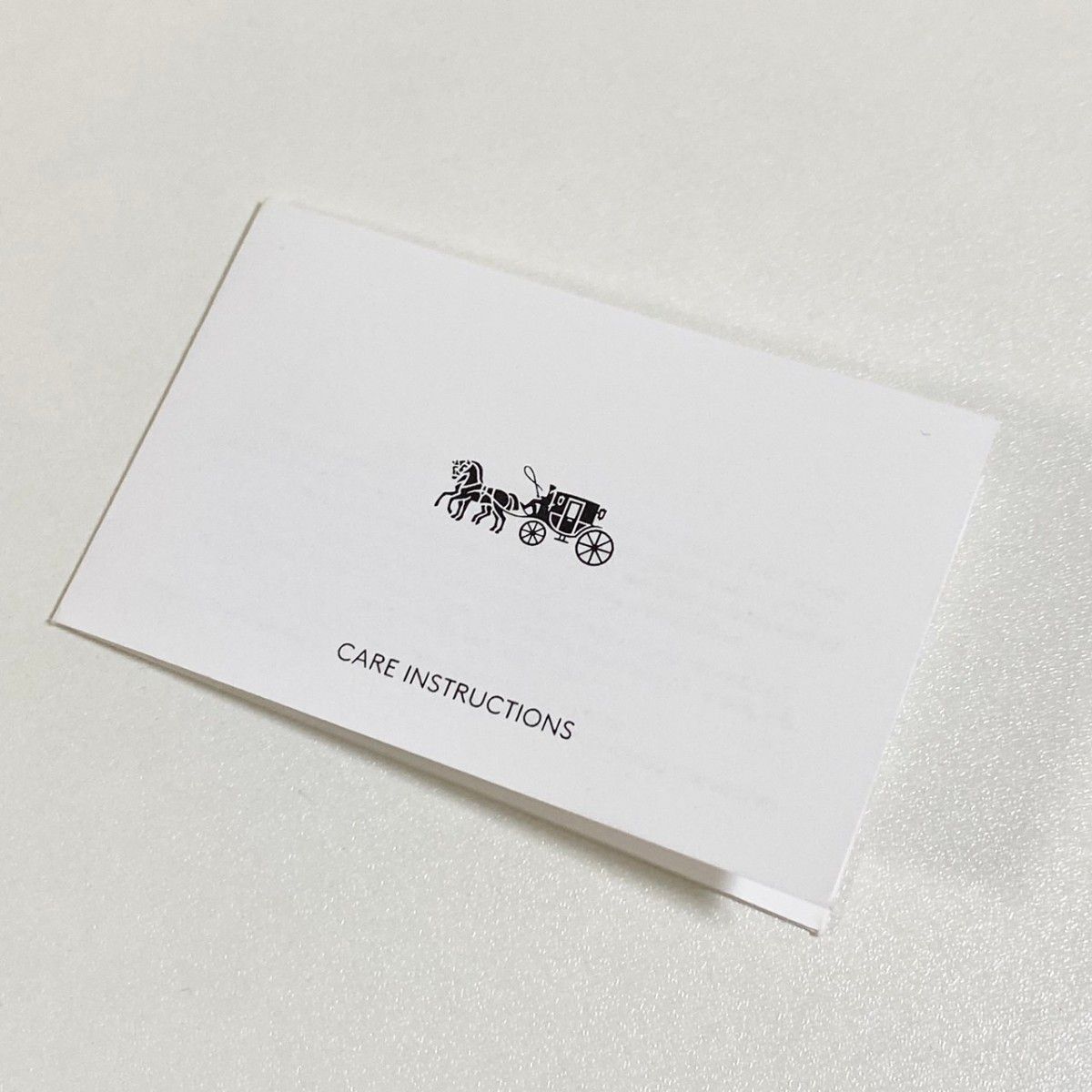 新品/未使用品 COACH 二つ折り財布 スヌーピー ワインマルチ CF252