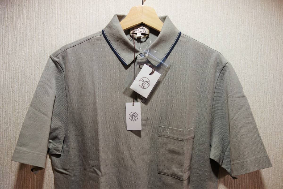  обычная цена 8.5 десять тысяч иен с биркой не использовался товар Hermes (HERMES) H Logo рубашка-поло размер M серый бежевый 