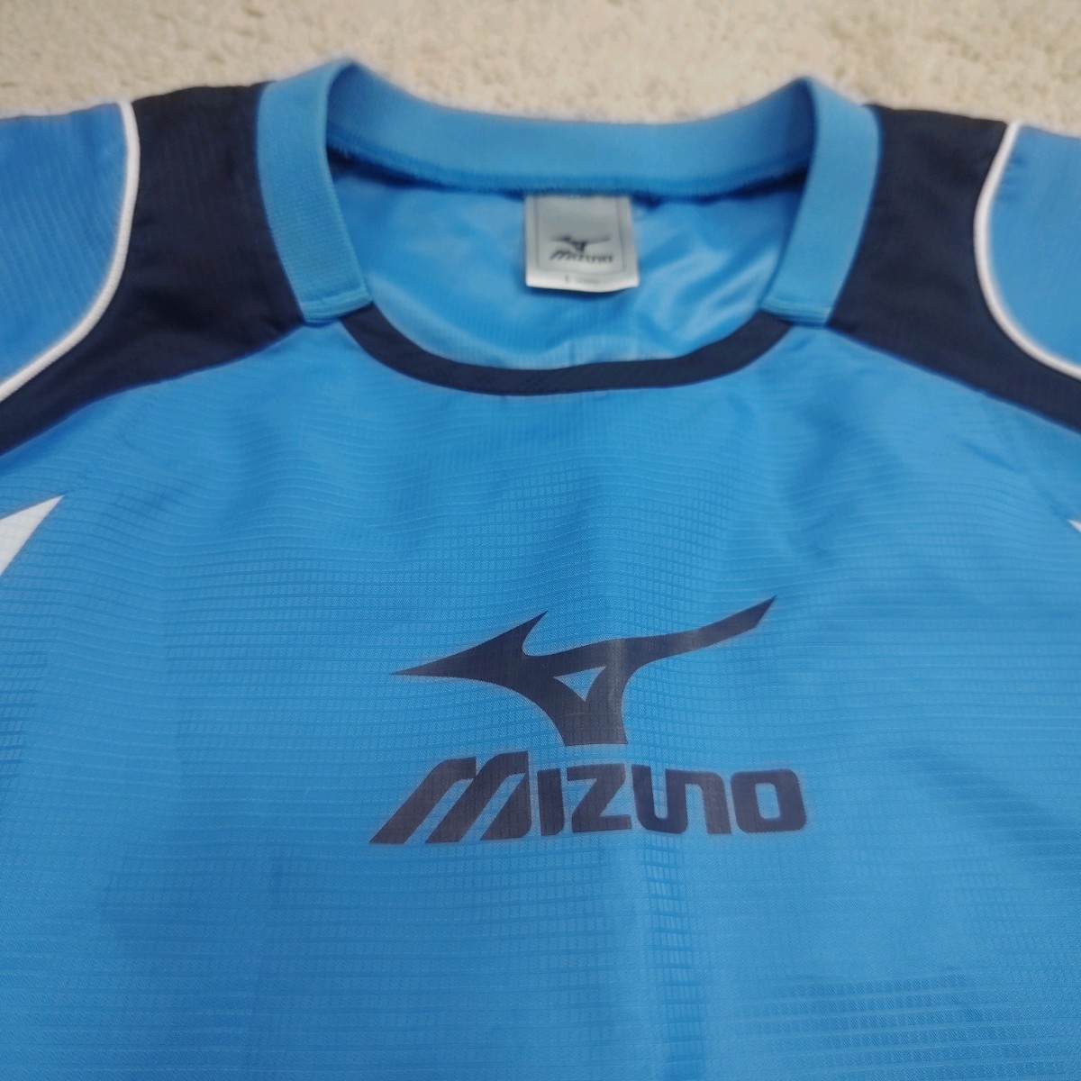 MIZUNO Mizuno pi stereo top and bottom set light blue × navy L size pants O size windbreaker setup training wear soccer 