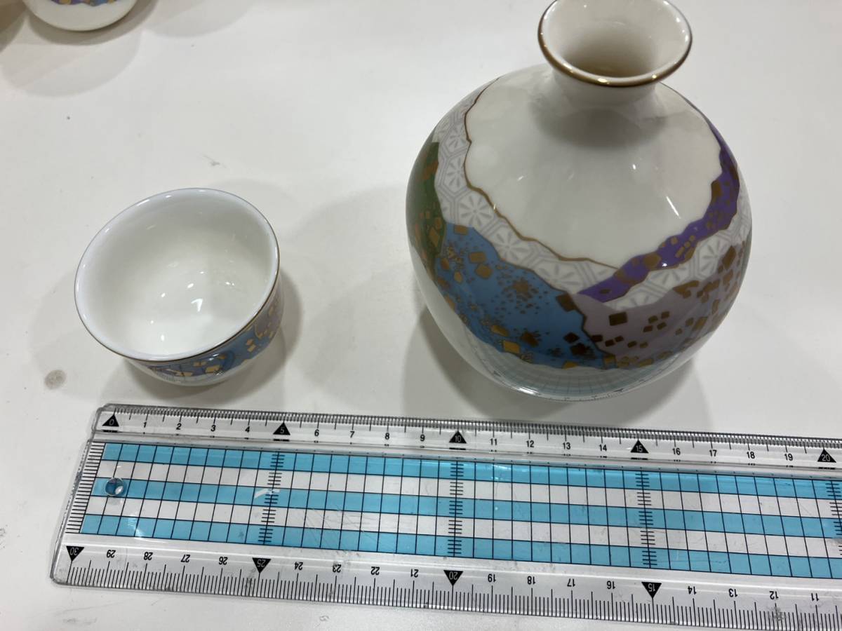 *[ unused ] sake cup and bottle .......