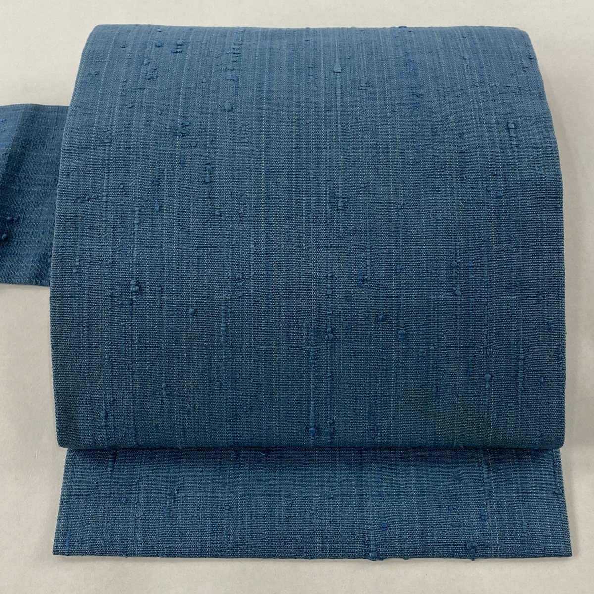 名古屋帯 逸品 浦野理一 縦節紬 青灰色 正絹 【中古 名古屋帯 逸品 浦野理一 縦節紬 青灰色 正絹 【中古