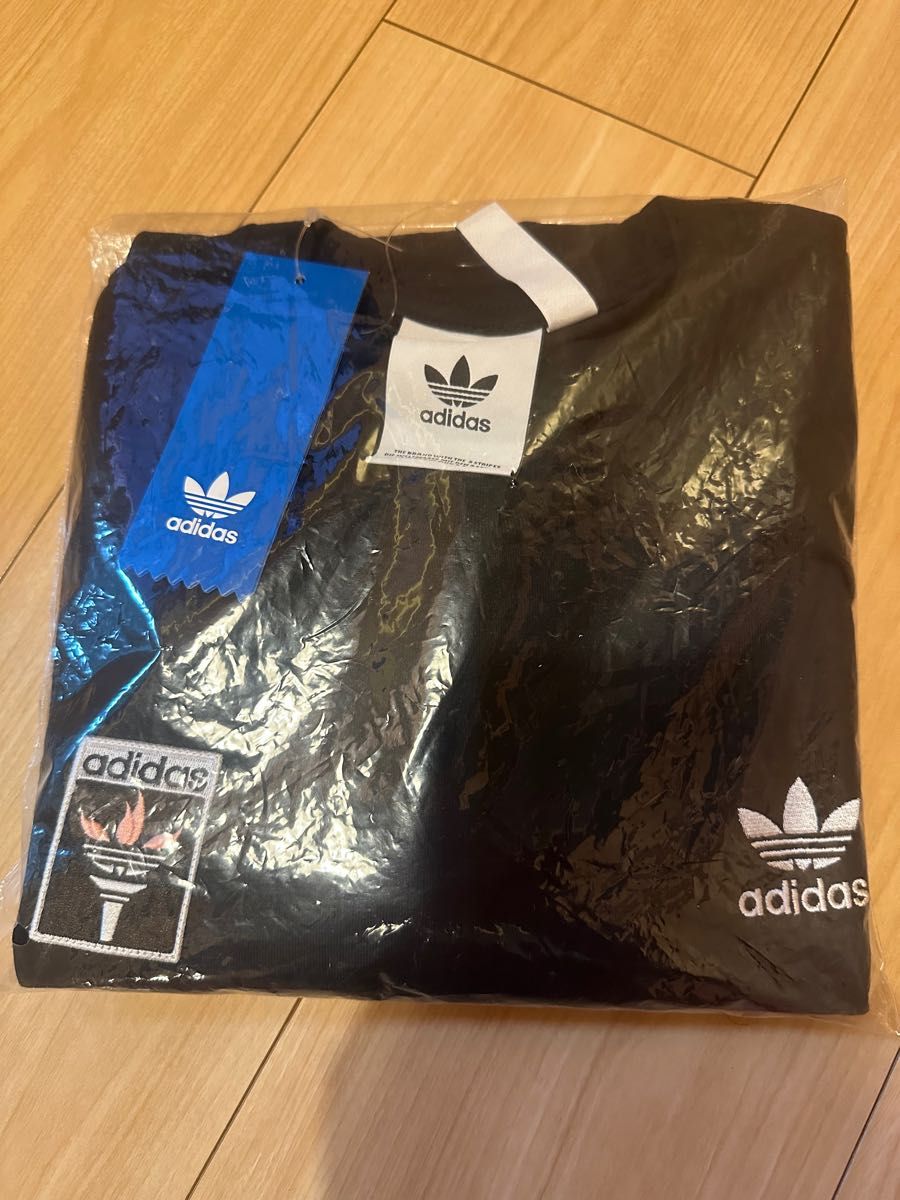 adidas originals アディダス オリジナルストレフォイル 聖火口ゴ Tシャツ