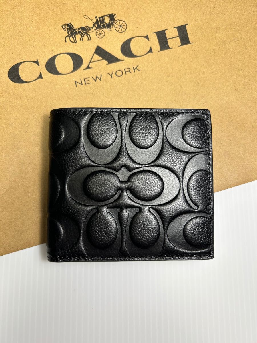 新品COACH メンズシグネチャー型押しロゴ 二つ折り財布｜PayPayフリマ