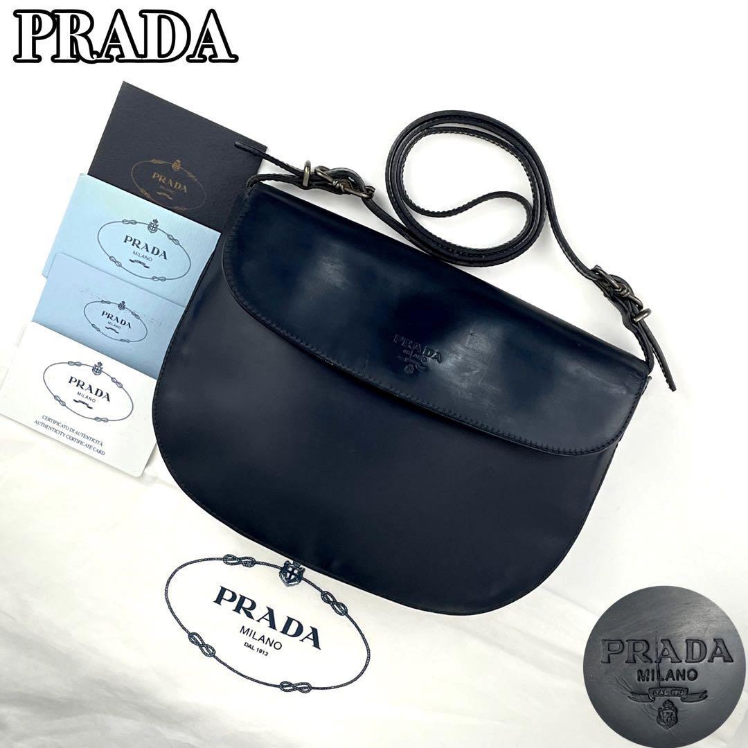 美品】PRADA プラダ ショルダーバッグ ロゴ型押し 裏地総柄 白タグ