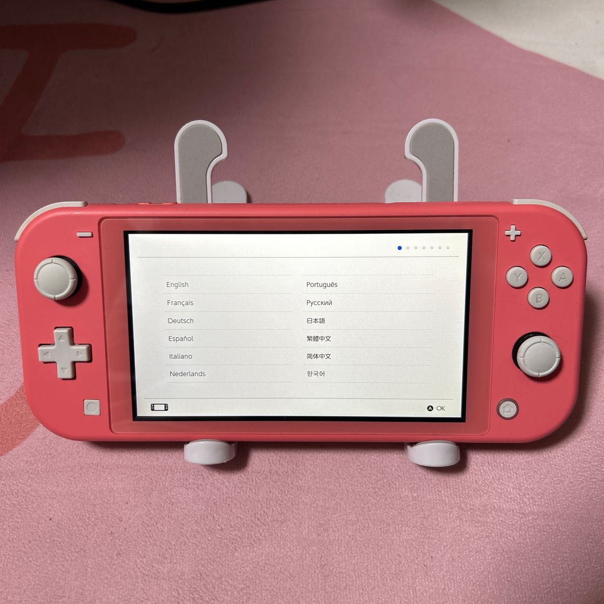 ニンテンドースイッチライトのコーラル 充電器のみあり 箱説明書なし