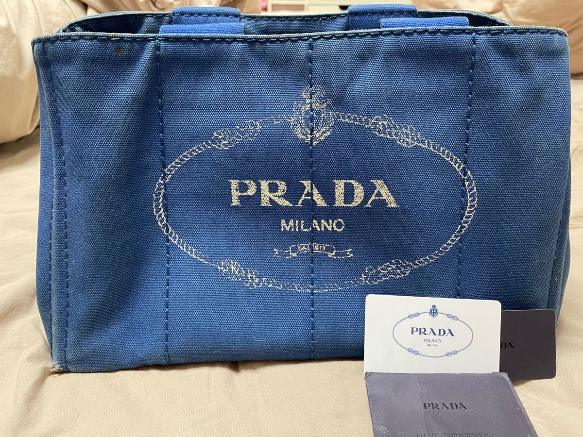 最終価格 値下げ交渉きてもお受けしませんPRADA プラダ カナパL 三角