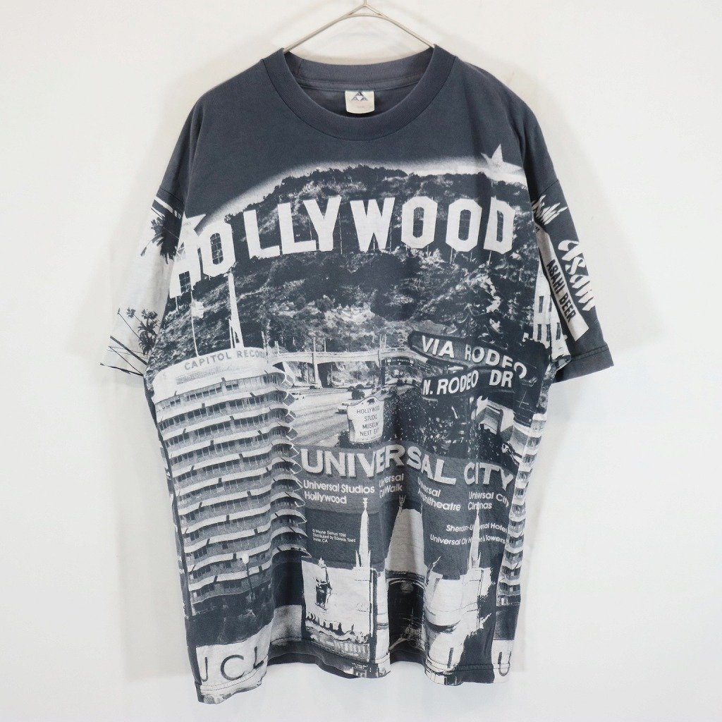 2000年代〜 USA製 ALSTYLE APPAREL&ACTIVEWEAR HOLLYWOOD 半袖Ｔシャツ 総柄 コットン ブラック (メンズ L) 中古 古着 N8505_画像1