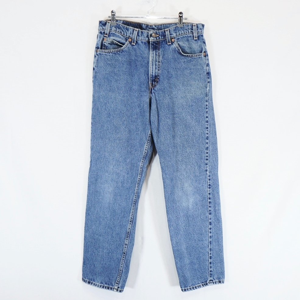 90年代 Levi's リーバイス 550 オレンジタブ デニムパンツ ブルー (メンズ 33-32) 中古 古着 N5355