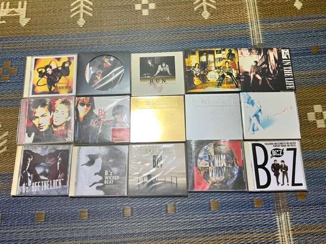 美品 Ｂ’z CDアルバム 　 PLEASUER.FRIENDS.BAD COMMUNCATION.RISKY.IN THE LIFE等 計15枚 他 ブックレット パズル付！_画像1