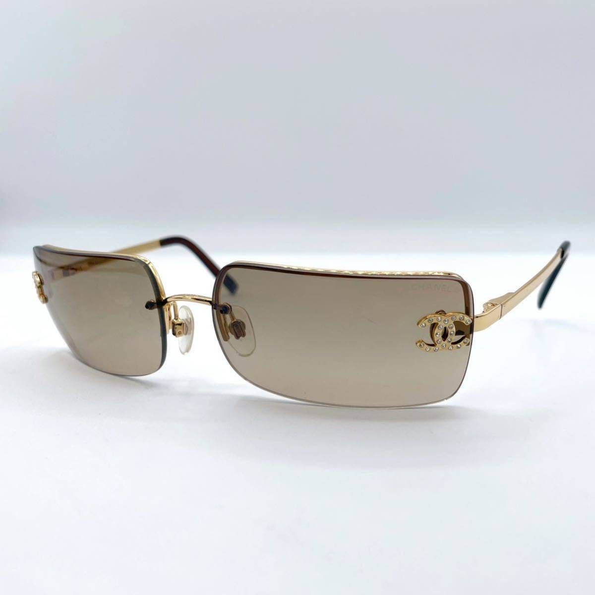 Sold at Auction: Chanel Brown Rimless CC Logo Sunglasses