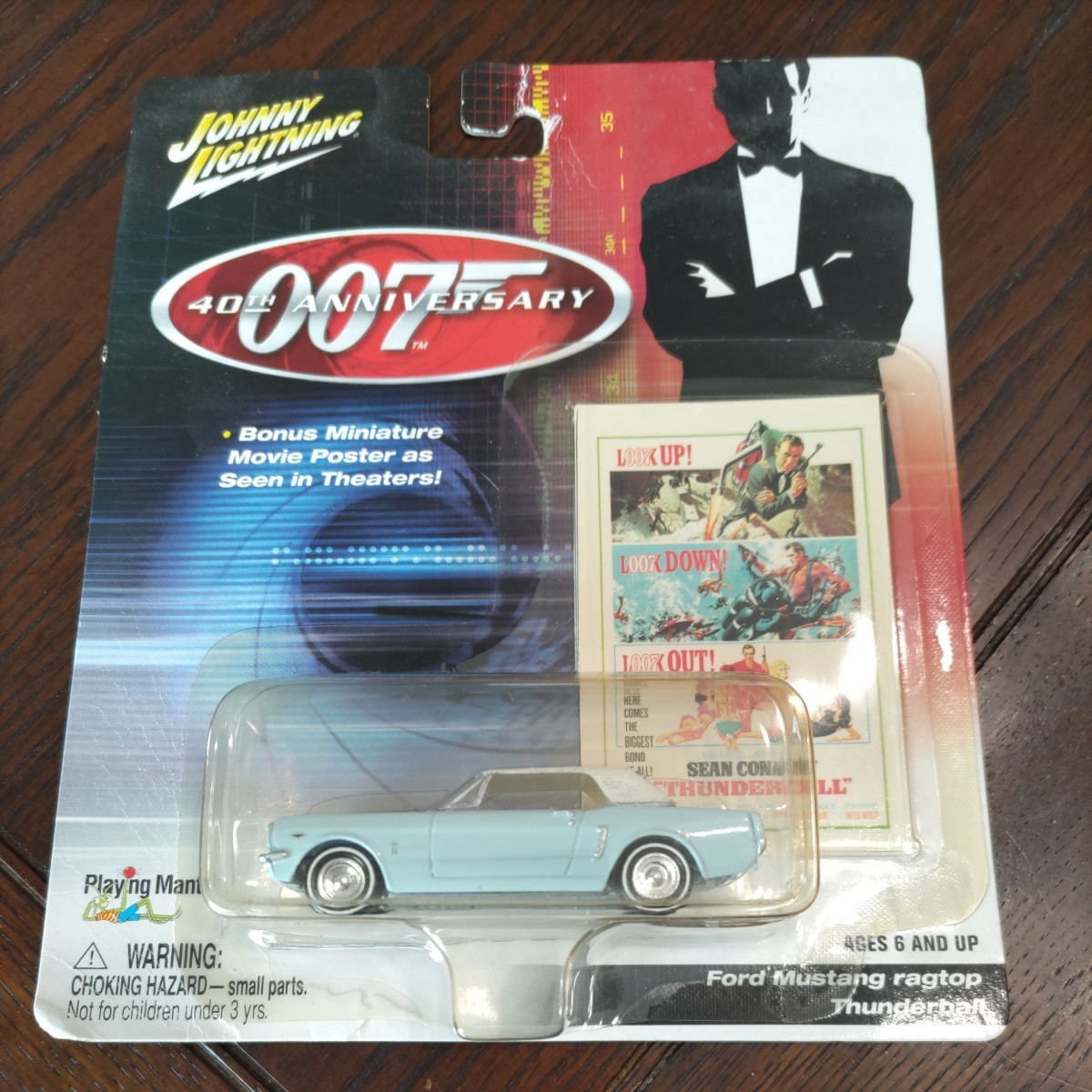 JOHNNY LIGHTNING 007 FORD MUSTANG RAGTOP ジョニーライトニング 左下にシワあり_画像1