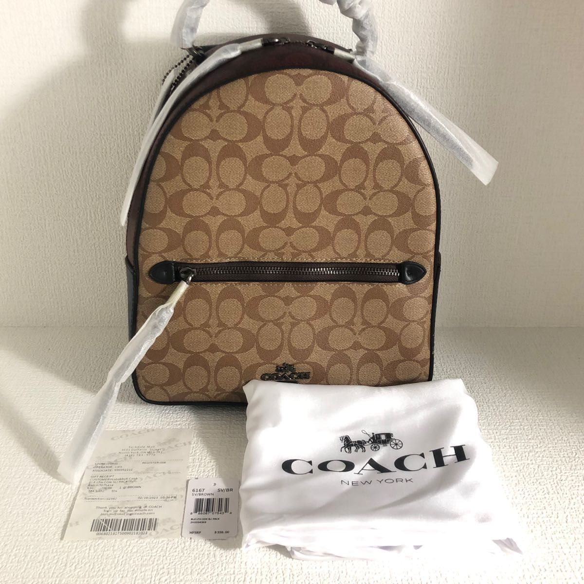 新品訳あり】コーチ リュックサック シグネチャー ベージュ ブルー