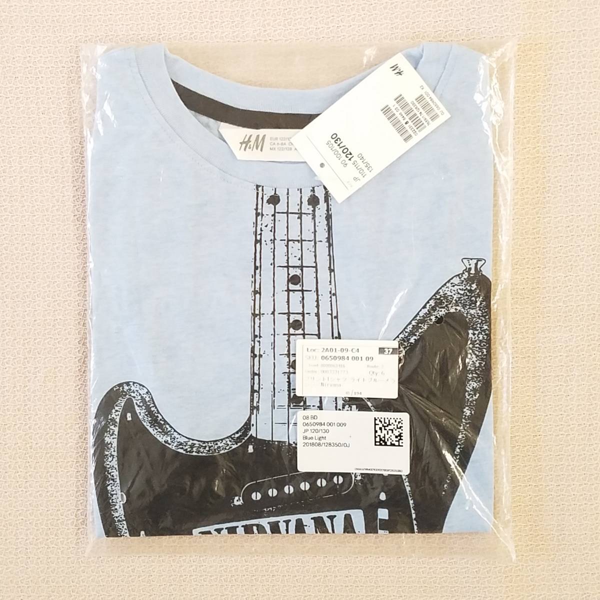 魅惑のバンドT特集! 新品未開封『H&M(エイチアンドエム) × NIRVANA(ニルヴァーナ)』キッズ 半袖Tシャツ ライトブルー 120/130／ロックT_画像1