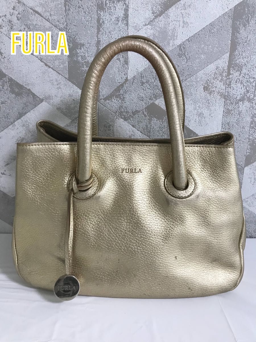 Sold at Auction: FURLA SALLY MEDIUM TOTE IN BURGUNDY LEATHER