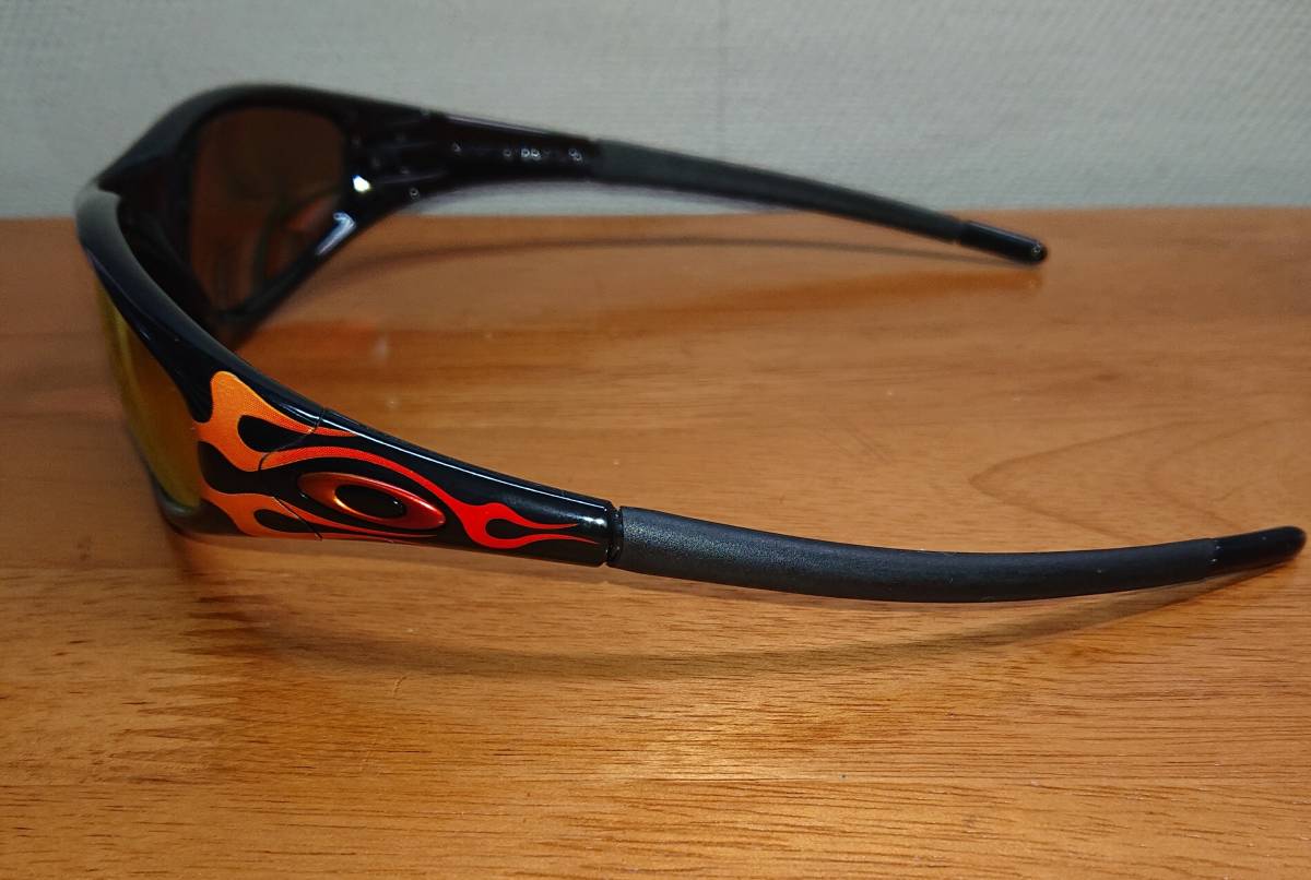 Oakley New Straight Jacket Jet Black Orange Flames w/ Red Oakley New Straight Jacket Jet Black Orange Flames w/ Red