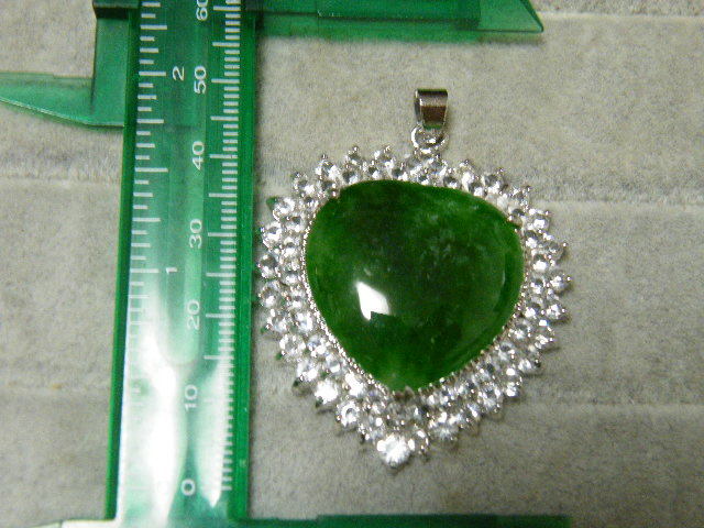 92074. jade .. green color stone unused 