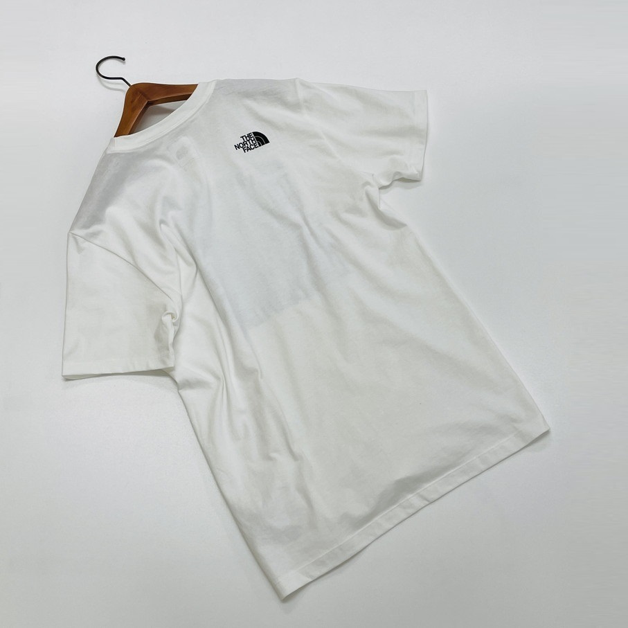 未使用品 /M/ THE NORTH FACE ホワイト 半袖Tシャツ メンズ レディース タグ カジュアル アウトドアキャンプレジャービーチ ノースフェイス