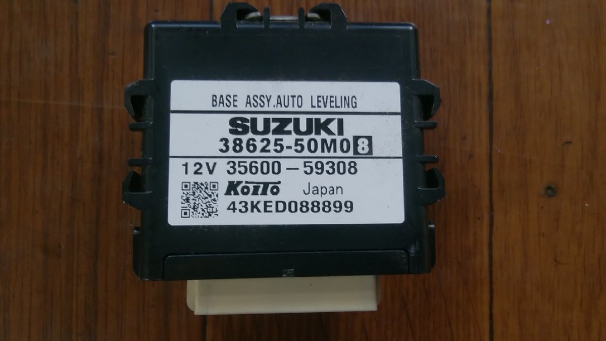 U#953 モコ ドルチェX MG33S 2014年 ライトオートレベリングコンピュータ 38625-50M08_画像1