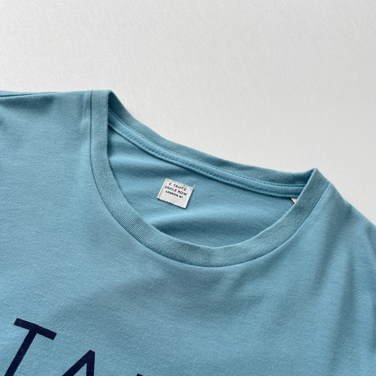 E.TAUTZ イングランド製 ロゴ プリント 半袖 Tシャツ 青 ライト ブルー 水色 フィッシュテール 綿 100% コットン イートウツ XS メンズ M_画像6