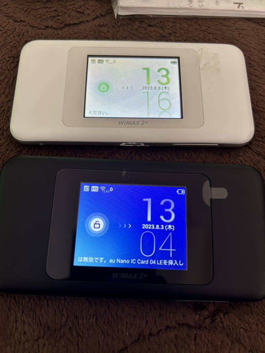 Speed Wi-Fi NEXT W06 two piece set! cradle .2 piece attaching instructions attaching! pocket Wi-Fi UQ WiMAX white body scratch black body almost unused white case attaching 