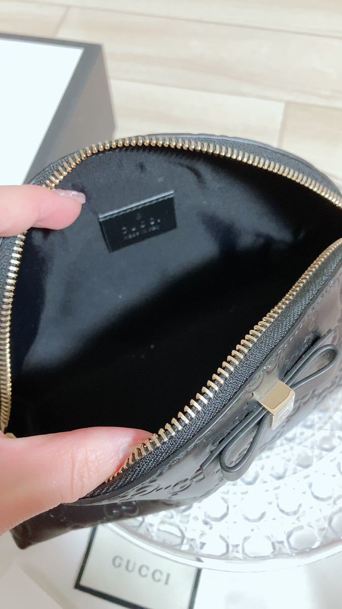 ヤフオク! - 未使用 GUCCI シマレザーリボンゴールド金具 ポーチ