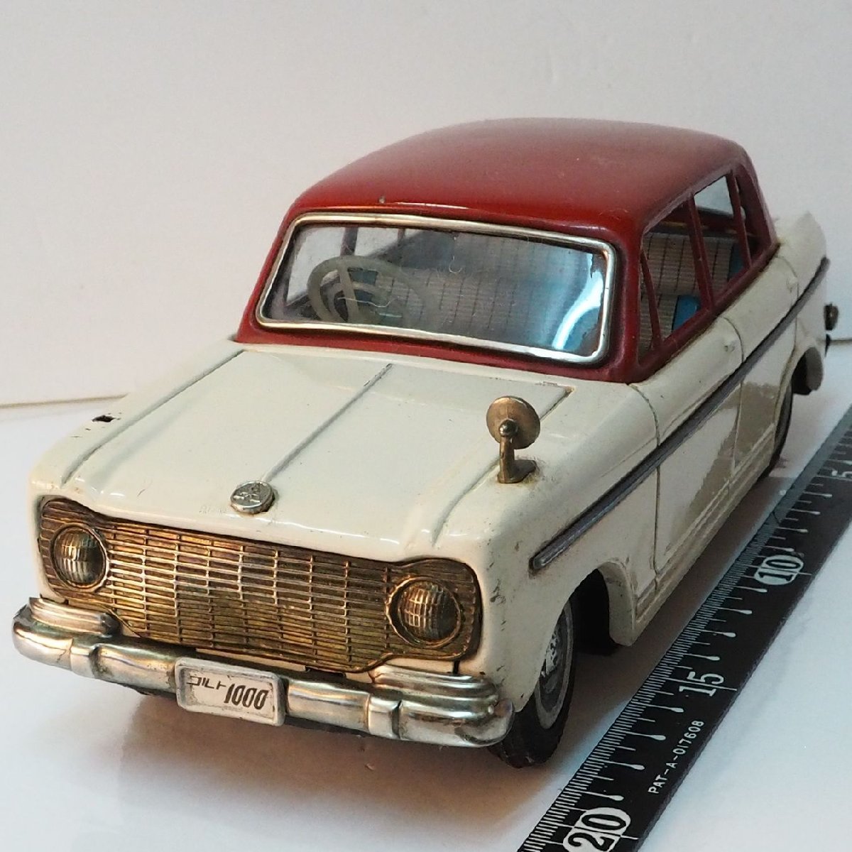 萬代屋【三菱コルト 1000 赤/白 MITSUBISHI COLT ミラー欠】フリクション ブリキ製ミニカー TIN TOY■旧バンダイ B.C.BANDAI 【箱無】0688_画像１