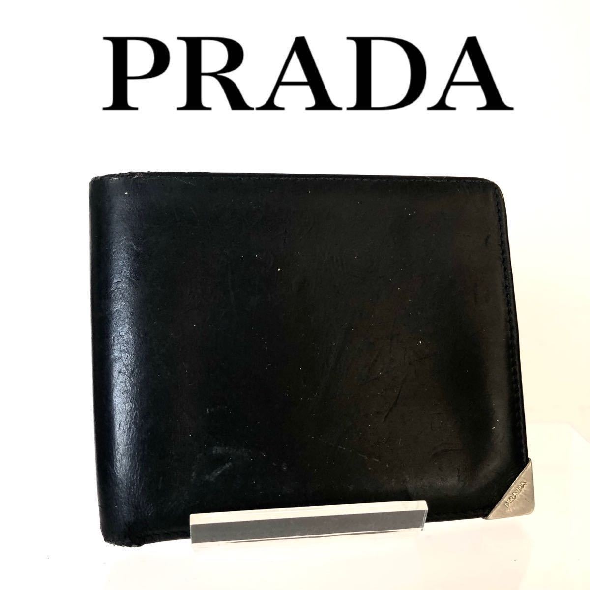 PRADA プラダ　二つ折り財布　札入れ　本革　レザー　三角金具　ブラック シルバー金具　イタリア製　刻印あり　メンズ_画像1