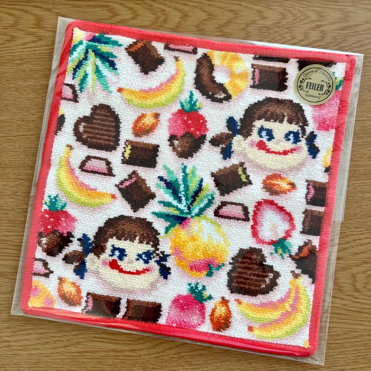 ラブラリー バイ フェイラー【完売】ペコアラモード ハンカチ 旗艦店限定オレンジ 不二家 ペコちゃん ペコニコスウィーツタイム