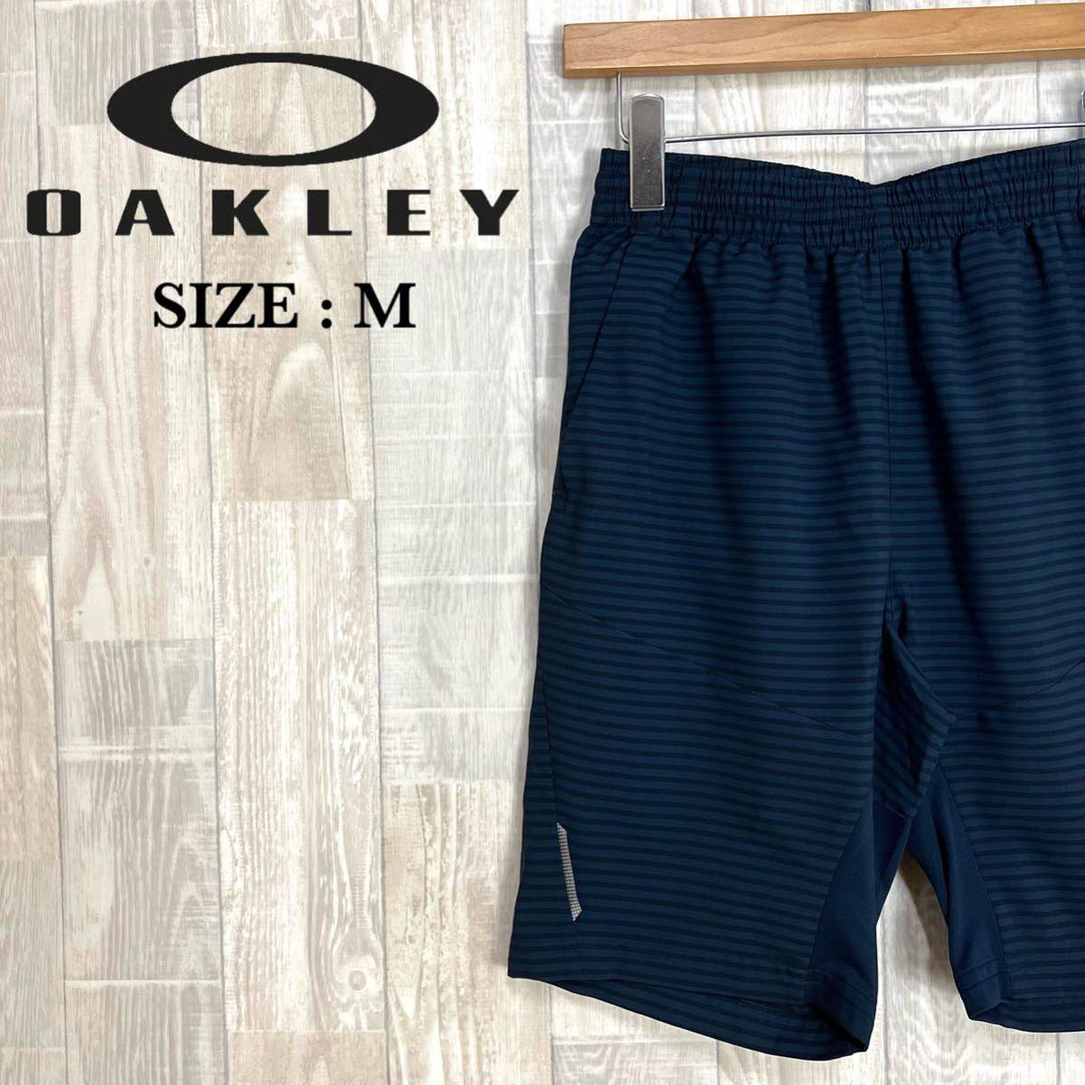 M2833 OAKLEY オークリー　クロスショートパンツ　Mサイズ　ネイビー　ボーダー　ハーフパンツ メンズ　半ズボン　スポーツウェア_画像1