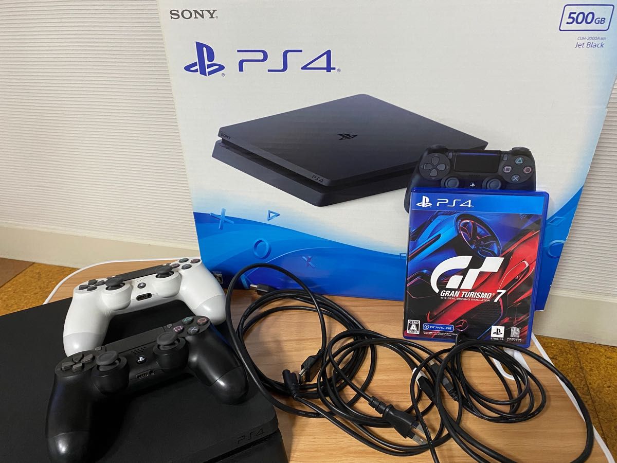 PS4本体（CUH-2000ABO1）、コントローラー2つ（白、黒）、グランツーリスモ7（ps4版）、LANケーブル（cat6a）