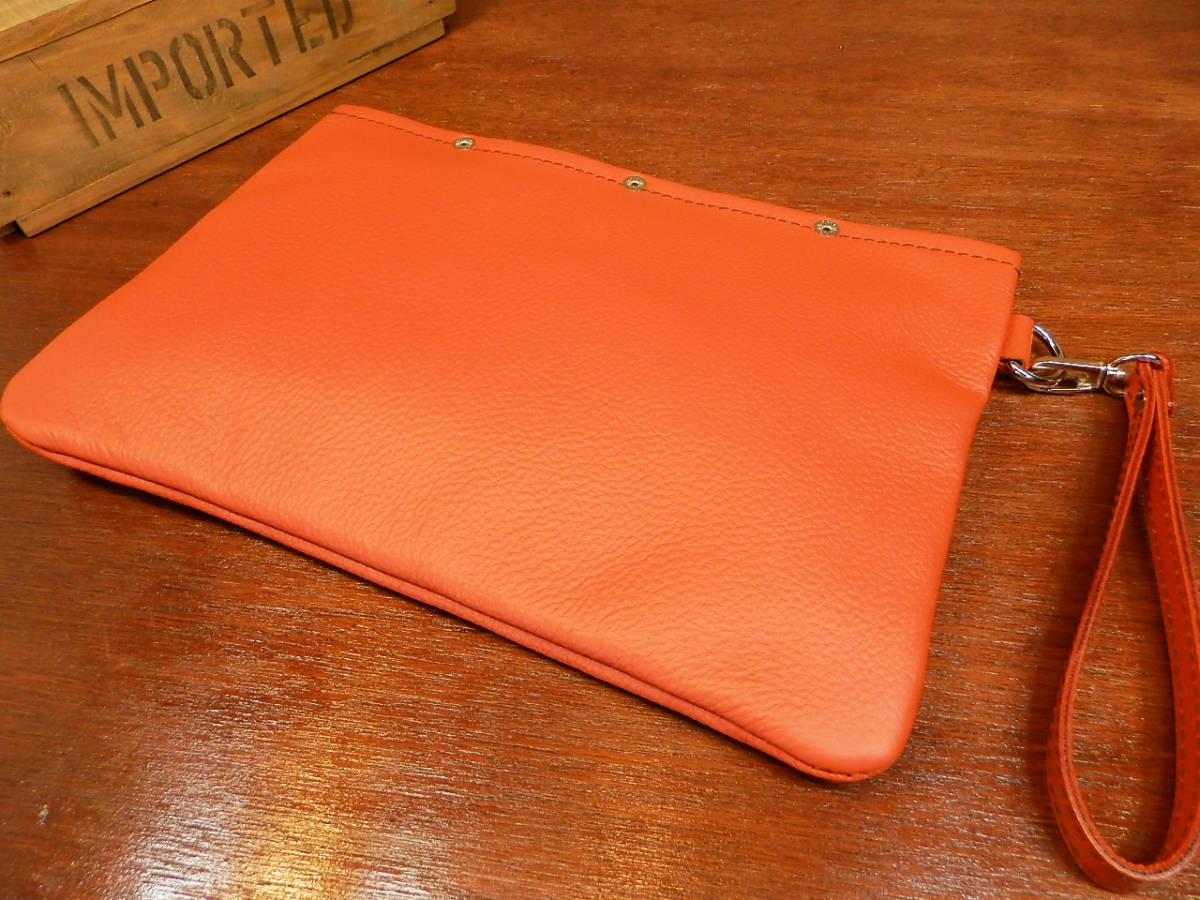  build-to-order manufacturing * vivid orange leather .. made did clutch bag. cow leather business made in Japan second bag 